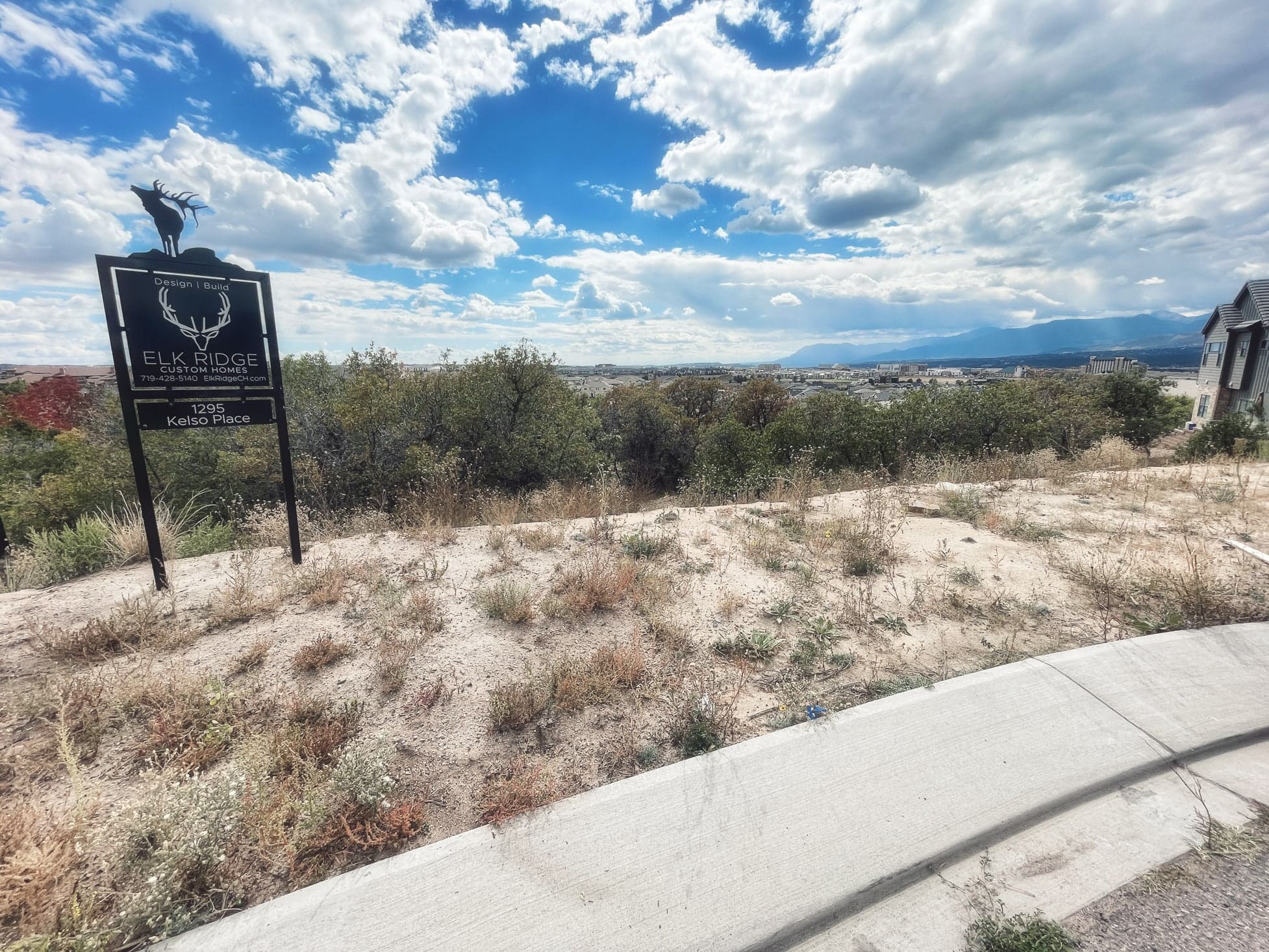 Elk Ridge Custom Home Builder Sign in Colorado Yard